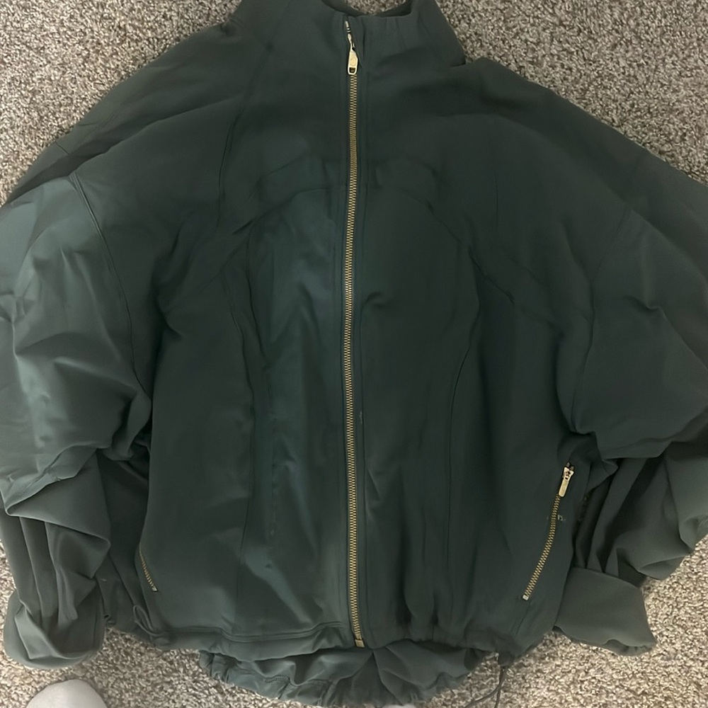 Lululemon green jacket.  Only worn once- excellent condition